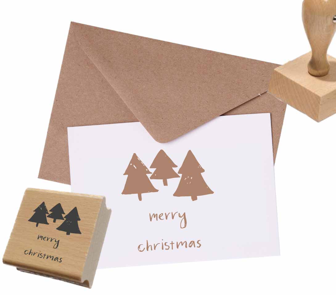 Weihnachtsstempel „Merry Christmas“ mit Tannenbäumen