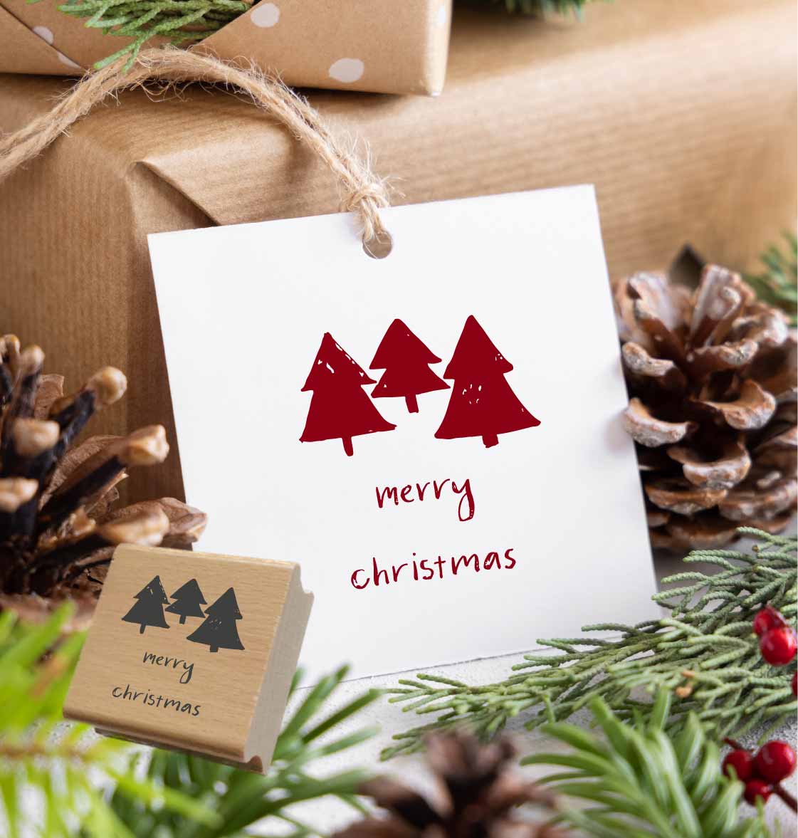 Weihnachtsstempel „Merry Christmas“ mit Tannenbäumen