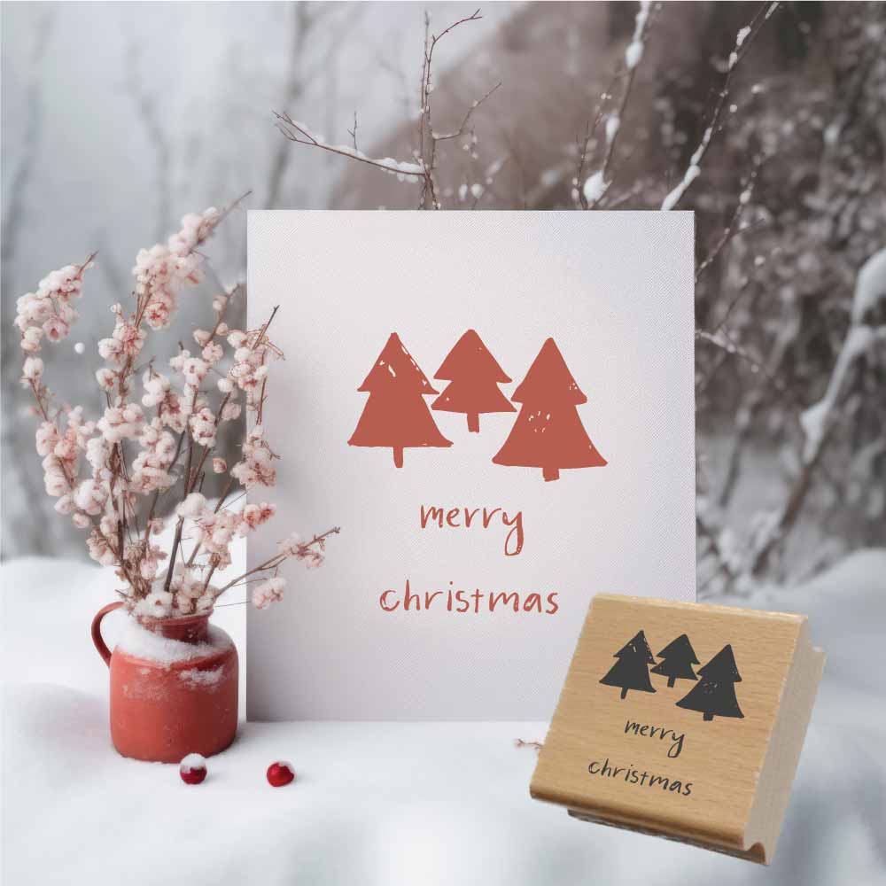 Weihnachtsstempel „Merry Christmas“ mit Tannenbäumen